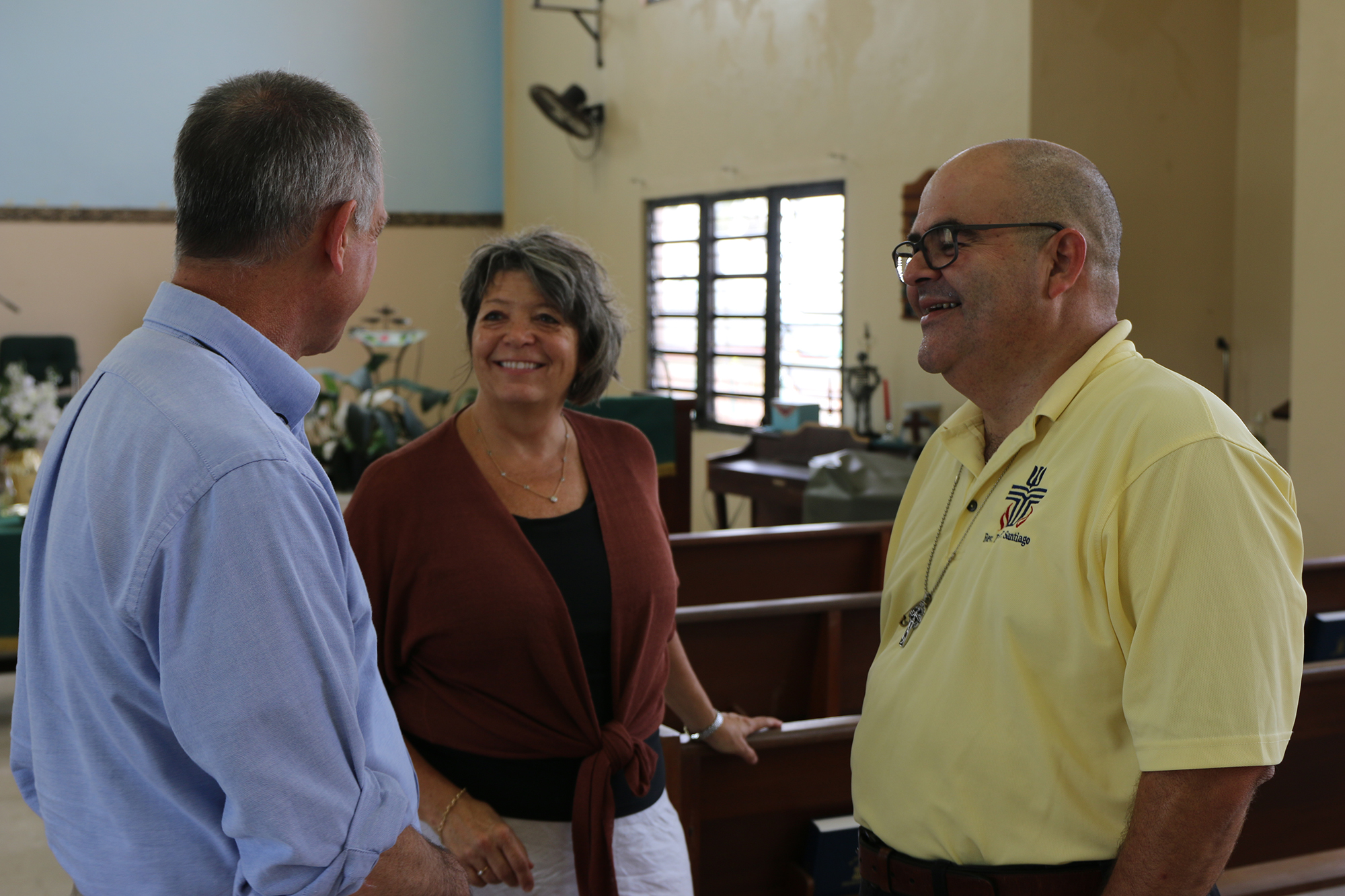 Rev. Kirk, Rev. Dr. Laurie Kraus with PDA, meet with Pastor Raúl Santiago-Rivera of Camarones Presbyterian Church. Photo by Rick Jones