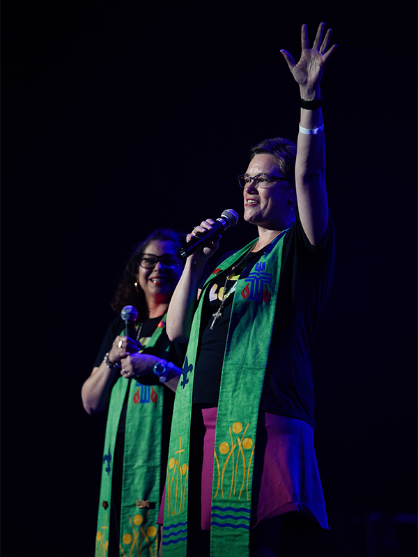 : Ruling Elder Vilmarie Cintrón-Olivieri and the Rev. Cindy Kohlmann, the Co-Moderators of the 223rd General Assembly, speak at last summer’s Youth Triennium. Photo by Rich Copley.